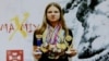 UKRAINE --- KILLED UKRAINIAN KICKBOXING CHAMPION
KARINA BAKHUR, WHICH FACE NOW ON
VLADYSLAV HERASKEVYCH’S
BANNED OLYMPIC HELMET