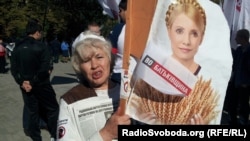 A Tymoshenko supporter holds up a portrait of the jailed former prime minister at a protest outside a courthouse in Kharkiv last week.