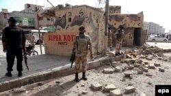 FILE: Pakistani rangers inspect the site of a bomb blast in Karachi (2016).