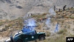 Афганские силы безопасности ведут бой против боевиков "Талибана". Провинция Нангархар, 25 сентября 2014 года.