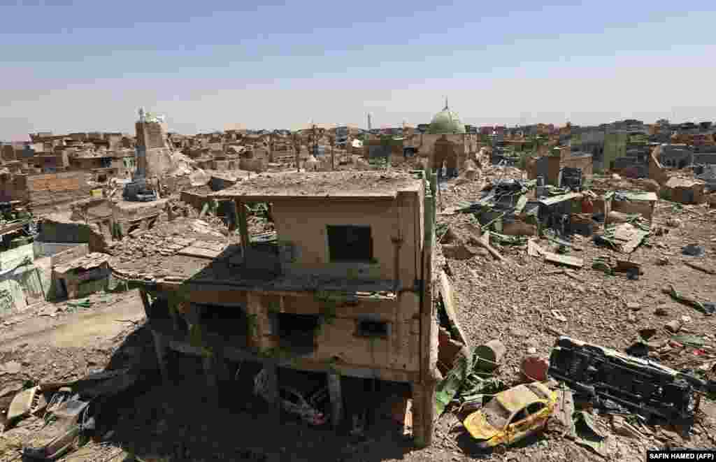 Damaged buildings in the Old City in western Mosul, Iraq, which was recently recaptured from the Islamic State extremist group. (AFP/Safin Hamed)