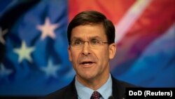U.S. -- U.S. Defense Secretary Mark T. Esper delivers remarks before ringing the closing NASDAQ bell for Veterans Day in New York, November 11, 2019