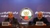 Wais Barmak (L), Afghan Interior Minister, speaks during a joint press conference with Afghan intelligence chief Masoom Stanekzai, in Kabul on February 1