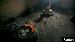 It's estimated that half a million children are killed each year as a result of indoor air pollution. (file photo)