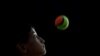 Shah Hussain, 12, performs during the 8th Afghanistan Juggling Championships.