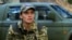 Ukraine - Yulia, call sign Dziga, a volunteer in the civilian defense forces, in a unit called the Bucha Witches - screen grab