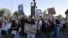 Demonstrators protest in Zaporizhzhya on July 23 against legislation that limits the independence of two anti-corruption agencies in Ukraine.