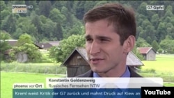 Konstantin Goldentsvaig, a Berlin-based reporter for NTV, speaking on the German public television station Phoenix during the Group of Seven (G7) summit in southern Germany.