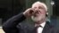 Slobodan Praljak drinks what turns out to be a fatal dose of potassium cyanide on live TV at his hearing in The Hague on November 29.