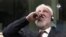 Slobodan Praljak at the court in the Hague shortly before the verdict was announced yesterday. 
