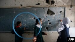Школа в секторе Газа, разрушенная во время военного конфликта
