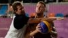 Russia's Aleksandr Zuev (left) fights for the ball with Latvia's Karlis Lasmanis during the men's gold medal 3x3 basketball final match during the Tokyo 2020 Olympic Games in July 2021.