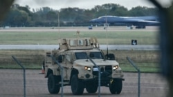 An armored vehicle patrols the RAF Fairford base in southwest England on September 28.