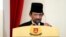 Султан Брунея Хассанал Болкиах на торжественном мероприятии, посвященном 50-летию Соглашения о взаимозаменяемости валют в Сингапуре и Брунее, июль 2017 года. Фото: AP.