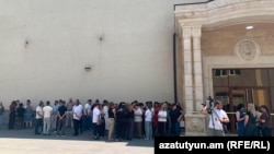 Armenia -Employees of Ggaik Tsarukian's Multi Tabak company demonstrate in Yerevan, July 14, 2026.