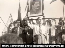 Nicolae Ceausescu (left) at a parade welcoming Soviet forces in August 1944.