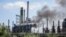 Black smoke can be seen rising from the refinery, which is in the immediate vicinity of Mamaia, the country's largest sea resort. 