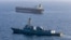 This US Navy handout photo released on May 7 by US Central Command Public Affairs shows the Arleigh Burke-class guided-missile destroyer USS Rafael Peralta implementing a maritime blockade against the Iran-flagged crude oil tanker vessel.