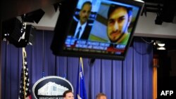 U.S. Attorney General Eric Holder (center) answers questions during a press briefing regarding the investigation into the attempted bombing in Times Square.