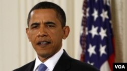 President Barack Obama makes an opening statement during a prime time news conference