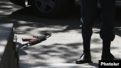 Armenia - An assault rifle left at the site of a deadly shooting in Yerevan, 14Sep2017.