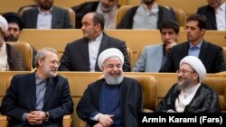 Iranian president Hassan Rouhani with the speaker of parliament and the head of judiciary. File photo 