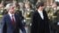 Armenia -- President Serzh Sarkisian and his visiting Swiss counterpart, Micheline Calmy-Rey, inspect the Armenian honor guard outside the presidential palace in Yerevan, 31Mar2011.
