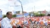 Turkey - Turkey's Prime Minister and the leader of Justice and Development Party (AKP) Tayyip Erdogan greets his supporters during an election rally in Erzurum, 10Jun2011