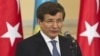 Kazakhstan - Turkey's Foreign Minister Ahmet Davutoglu speaks during a news briefing with Kazakhstan's Foreign Minister Yerlan Idrisov in Almaty, 26Apr2013