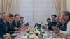 U.S. Secretary of State Rex Tillerson (L) sits across from Pakistani Prime Minister Shahid Khan Abbasi (R) during their meeting with delegations, at the Prime Minister's residence, in Islamabad on October 24.