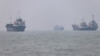 Vessels lie off the port of Bandar Abbas in Iran amid a US naval blockade of Iranian shipping. (file photo)