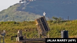 An Israeli Iron Dome defense system is shown deployed in the Golan Heights.