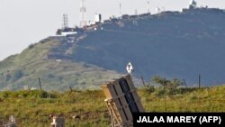 A picture taken on April 14, 2018 shows an Israeli Iron Dome defence system, designed to intercept and destroy incoming short-range rockets and artillery shells, deployed in the Israeli-annexed Golan Heights near the border with Syria.