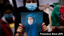 آرشیف، اعتراض و بیان وضعیت زنان در افغانستان از سوی یک زن افغان