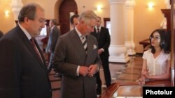 Prince Charles (center) and former Armenian Prime Minister Armen Sarkisian visit the Matenadaran museum of Armenian manuscripts in Yerevan on May 28.