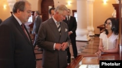 Armenia - Britain's Prince Charles (R) and former Armenian Prime Minister Armen Sarkisian visit the Matenadaran museum of Armenian manuscripts in Yerevan, 28May2013. 