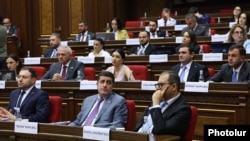 Armenia - Deputies of the opposition Strong Armenia alliance attend a session of the Armenian parliament, Yerevan, August 17, 2026.
