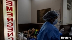 Կորոնավիրուսով ախտահարված բնակիչը բուժում է ստանում «Սուրբ Ընտանիք» հիվանդանոցում, Նյու Դելի, Հնդկաստան, 29 ապրիլի, 2021թ.