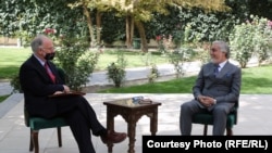 The U.S. Embassy in Kabul's chargé d’affaires, Ross Wilson (left), meets with Afghanistan High National Reconciliation Council head Abdullah Abdullah on September 24, 2020.