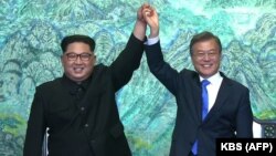 Demirgazyk Koreýanyň lideri Kim Jong Un bilen Günorta Koreýanyň prezidenti Mun Jaý