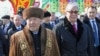 Kazakh President Qasym-Zhomart Toqaev (right) walks with former President Nursultan Nazarbaev in 2019. Toqaev has chosen to micromanage the upcoming election just as Nazarbaev used to, say observers, instead of proving his commitment to democratization.