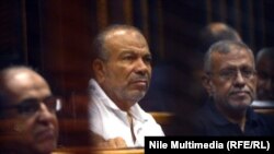 Лидеры движения «Братья-мусульмане» - на скамье подсудимых. Каир, 18 августа 2014 года. 