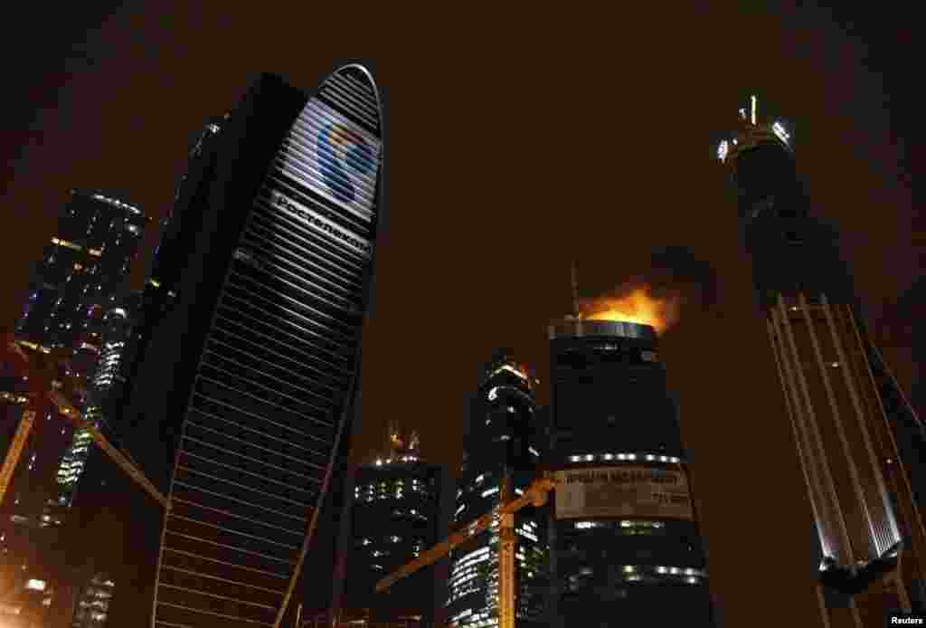 Russia -- A general view shows a fire burning in the Federation Tower complex of the "Moscow City" business district in Moscow, 02Apr2012