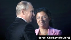 Маргарита Симоньян и президент России Владимир Путин. Архивное фото