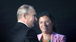 Vladimir Putin və RT telekanalının baş redaktoru Margarita Simonyan