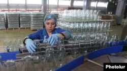 Armenia - A worker at a cannery in Ararat province, 19Apr2014.