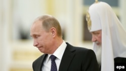 Президент Владимир Путин и патриарх Кирилл