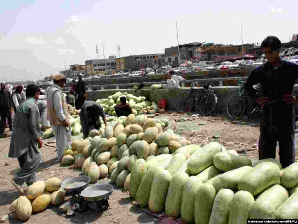 Afghanistan, Kabul—Afghan sellers sells watermelons during Eid day in Kabul Markets (froshgah), 29August2011