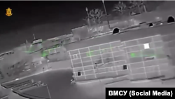 Скриншот с видео ВМС Украины, на котором запечатлена атака дрона по зданию российского оборонного концерна «Алмаз-Антей» в Севастополе