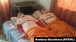 Участницы акции протеста против выплаты «недостаточной суммы» компенсации за изъятие земельных участков , 22 августа 2014 года.